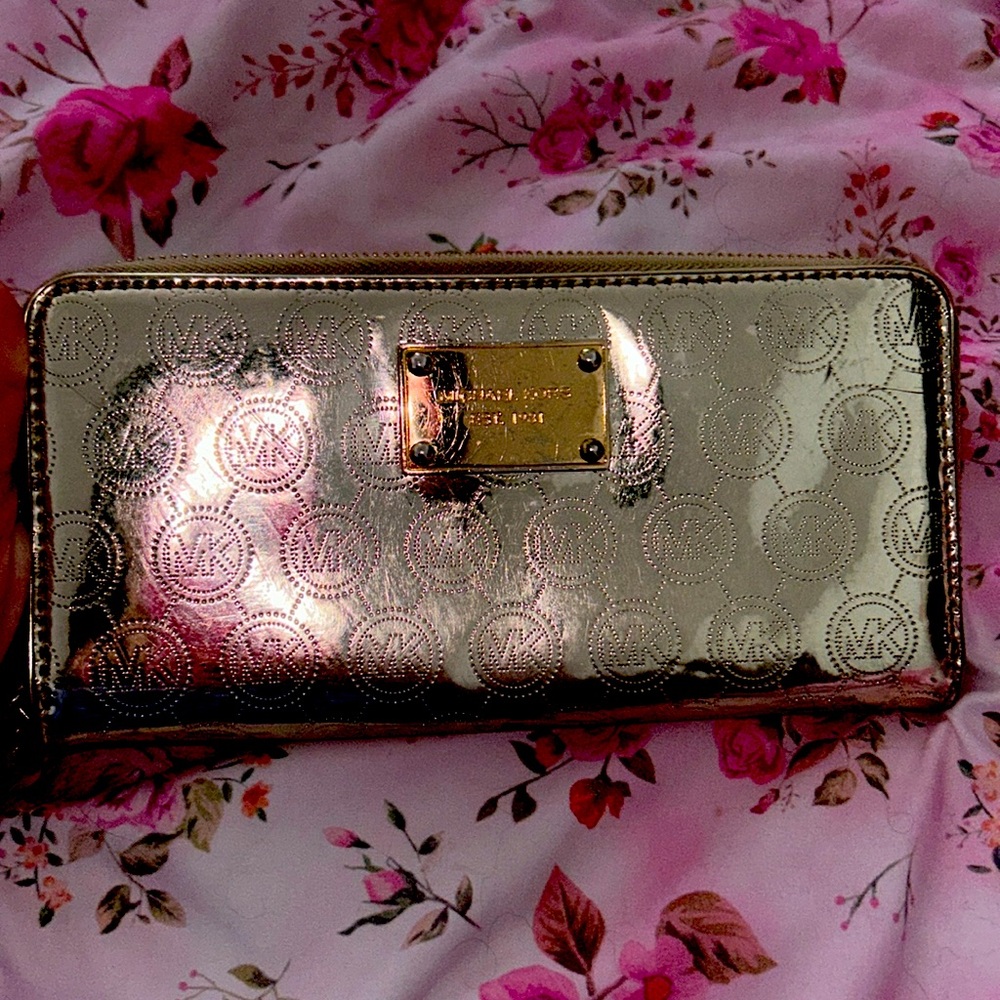 Gold Michael Kors wallet with some scratches on front ZIP around with 12 cards!